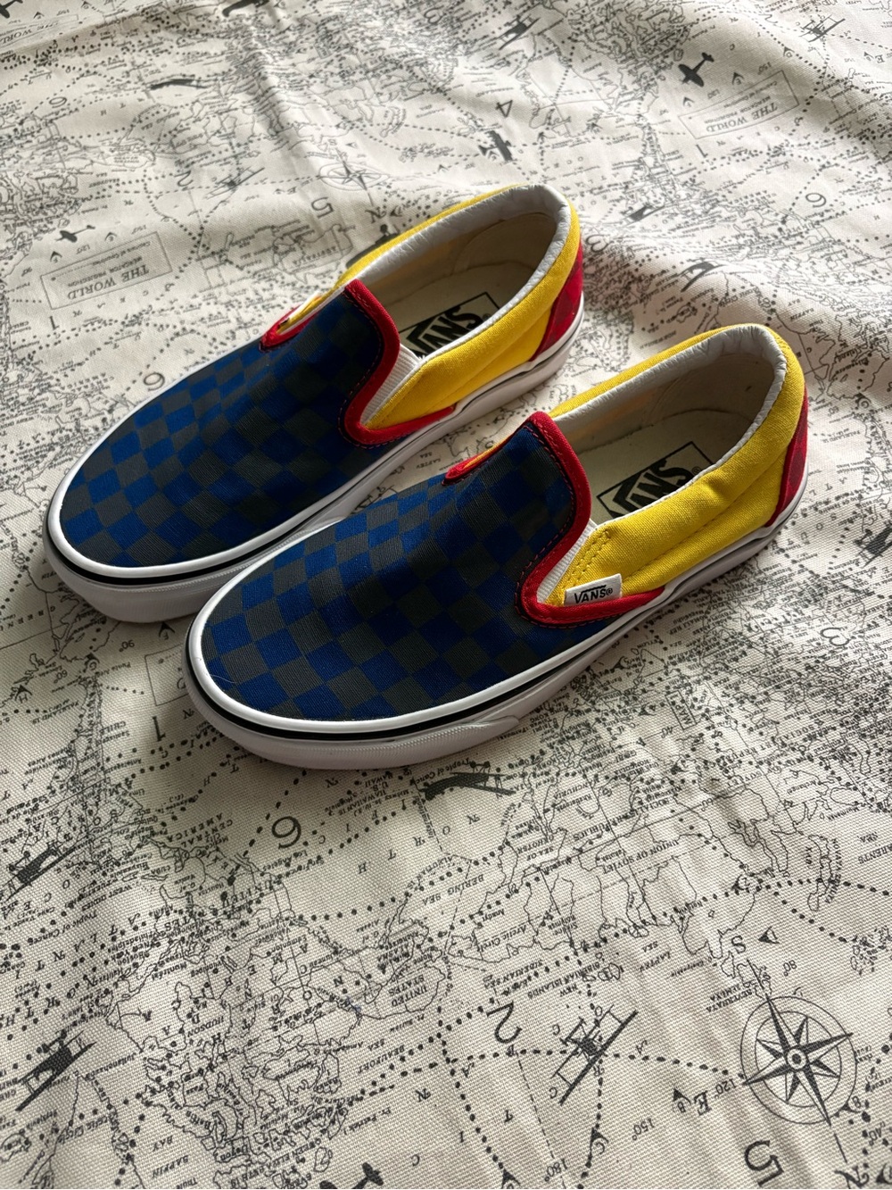 Vans Kids Checkerboard Slip-On Sneakers in Blue, Yellow, Red
